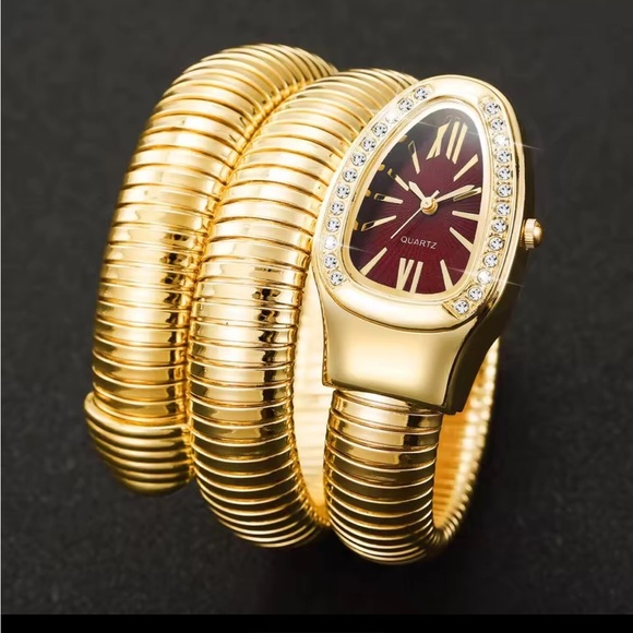 Anthropologie Accessories - Serpenti serpent Gold and wine red Women's Watch